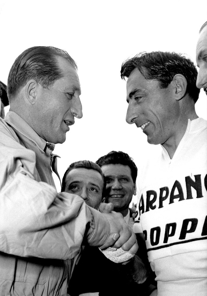 A close-up of men shaking hands

AI-generated content may be incorrect.